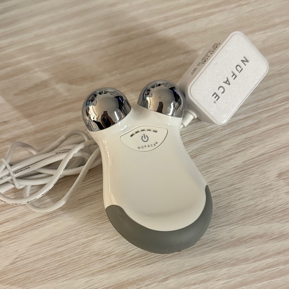 NuFace Mini Facial Device in White and Gray with Silver Spheres
